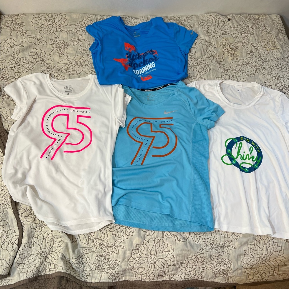 4 running shirts - 2 small 2 medium